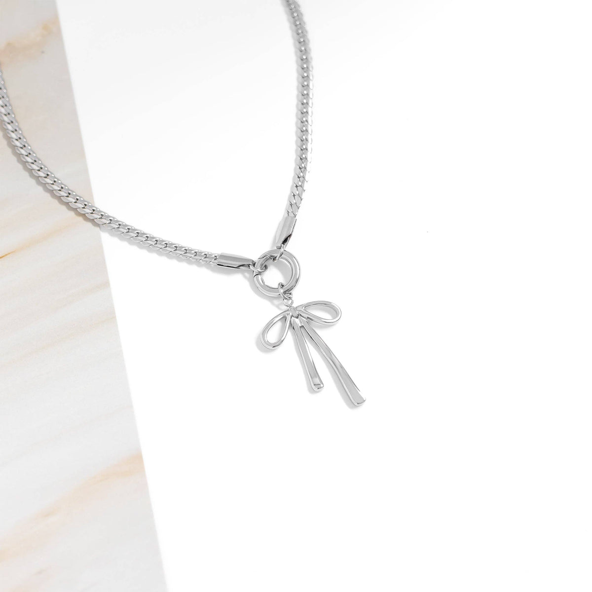 18K Gold PVD Stainless Steel Long Bow Charm: Stainless