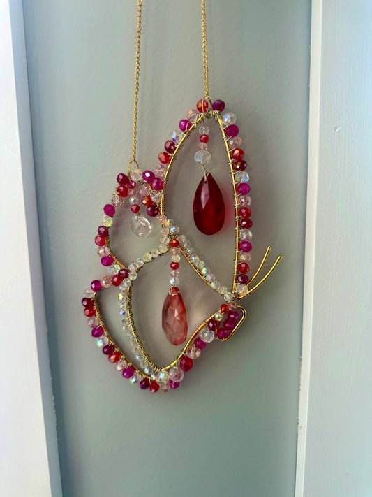 Pink, red and white butterfly suncatcher