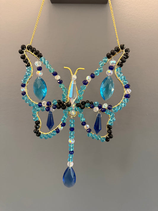 Aqua blue, dark blue, black and white Butterfly Suncatcher